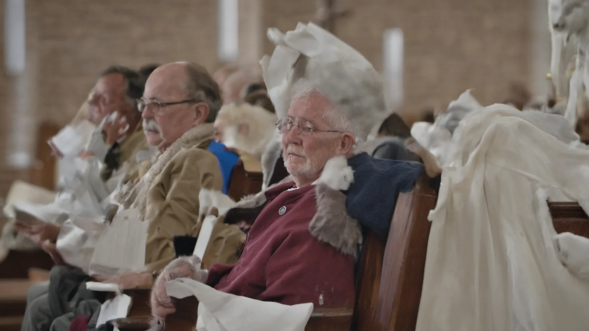 endeavor photographic of new england parishioner sitting on pew of church that just got air conditioning that is so cold there are icicles forming on his brow wide
