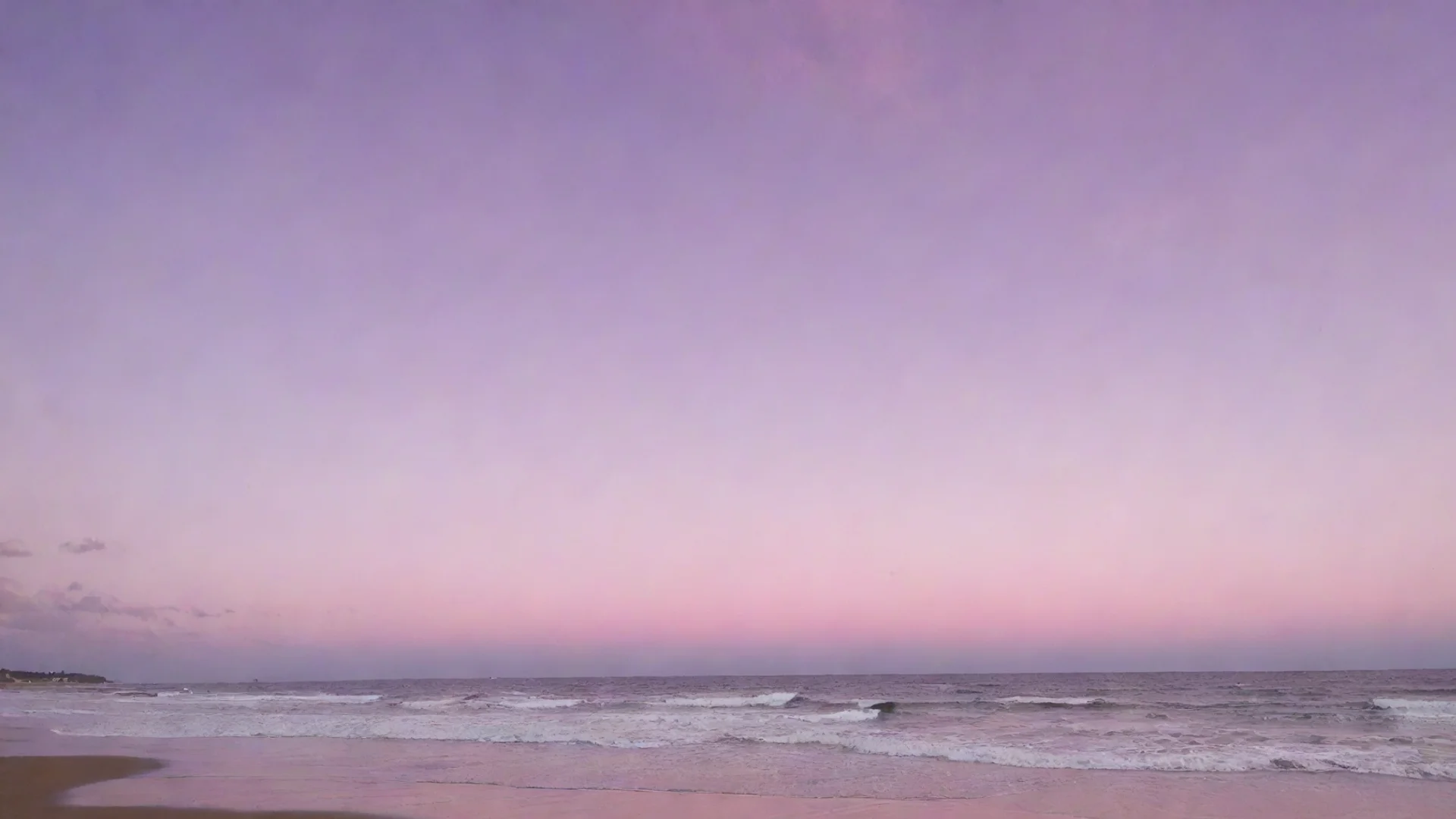purple pink sky at a beach wide