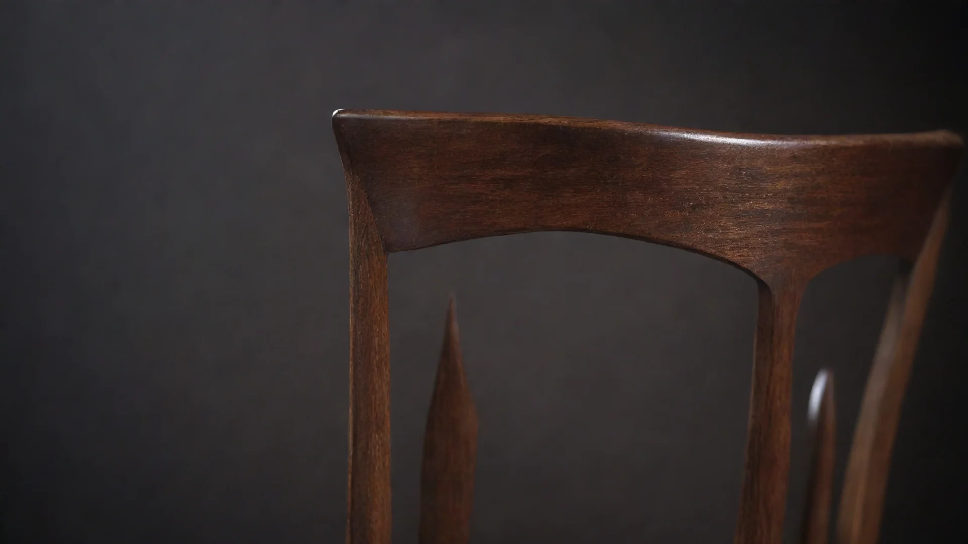 aitrending detail view of a modern dark brown wooden chair back%2C image blurred at the edge with high craftsmanship and dark background good looking fantastic 1 hdwidescreen